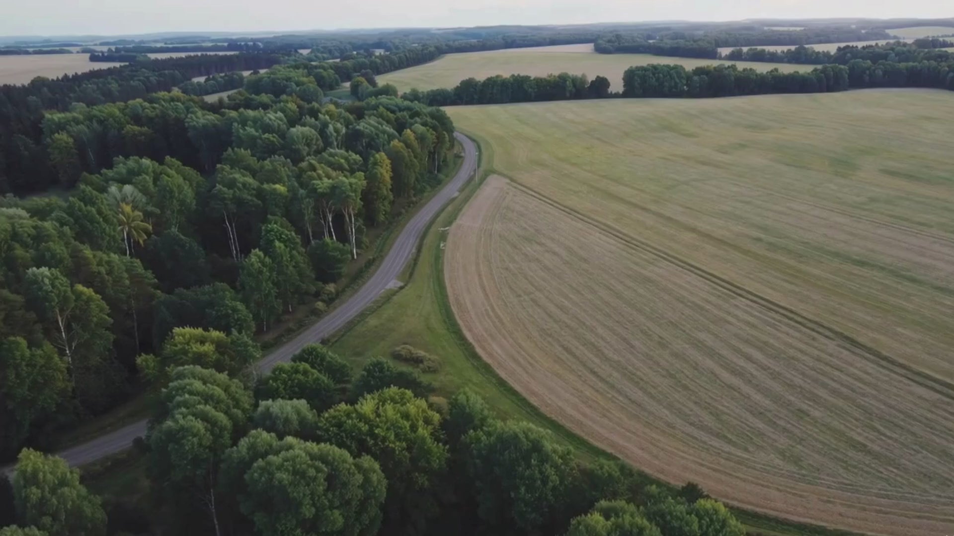 Video showing glamping feasibility and planning stage, featuring hands reviewing shaded site maps, planning constraints, and zoning layouts — representing the critical permissions and site analysis phase in glamping site development with Home Living Luxury.