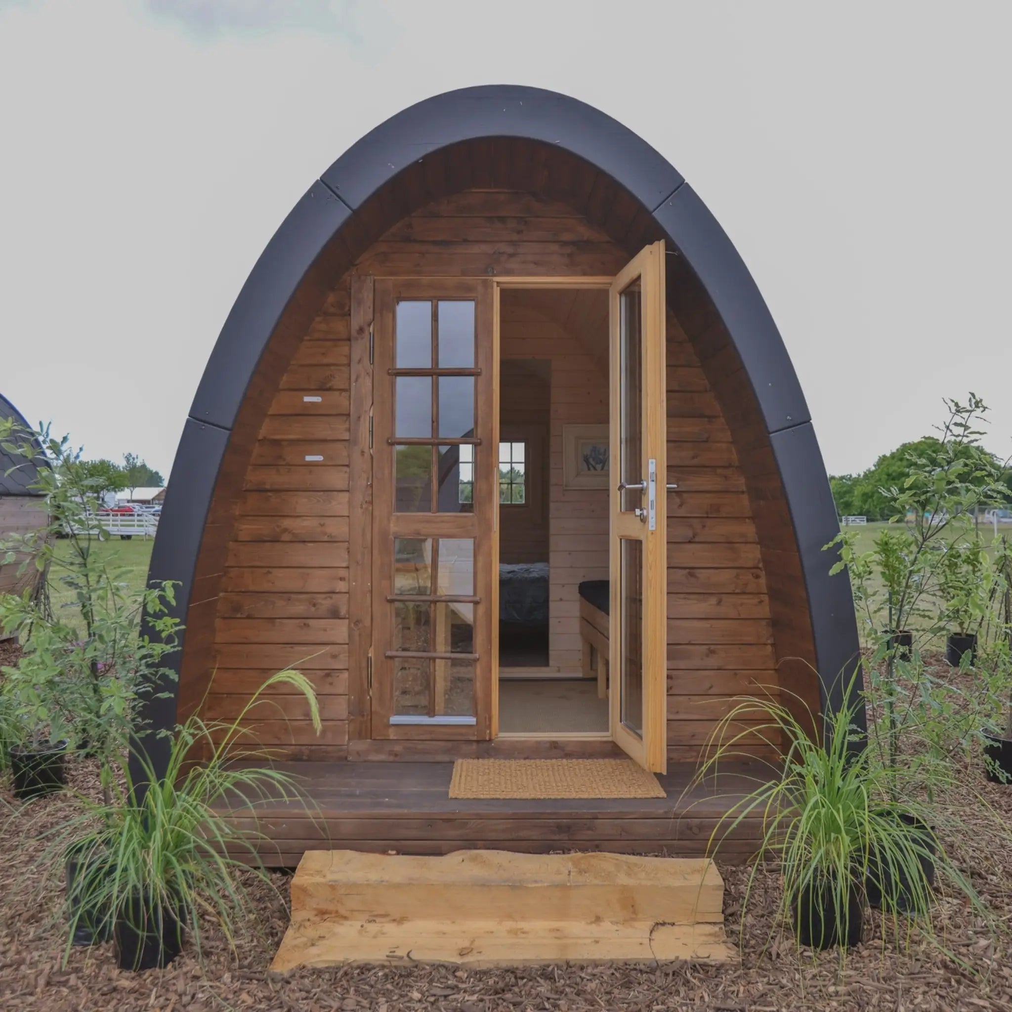 Exterior view of a 2-person glamping pod, used to compare insurance costs for small pods in the UK and Ireland.