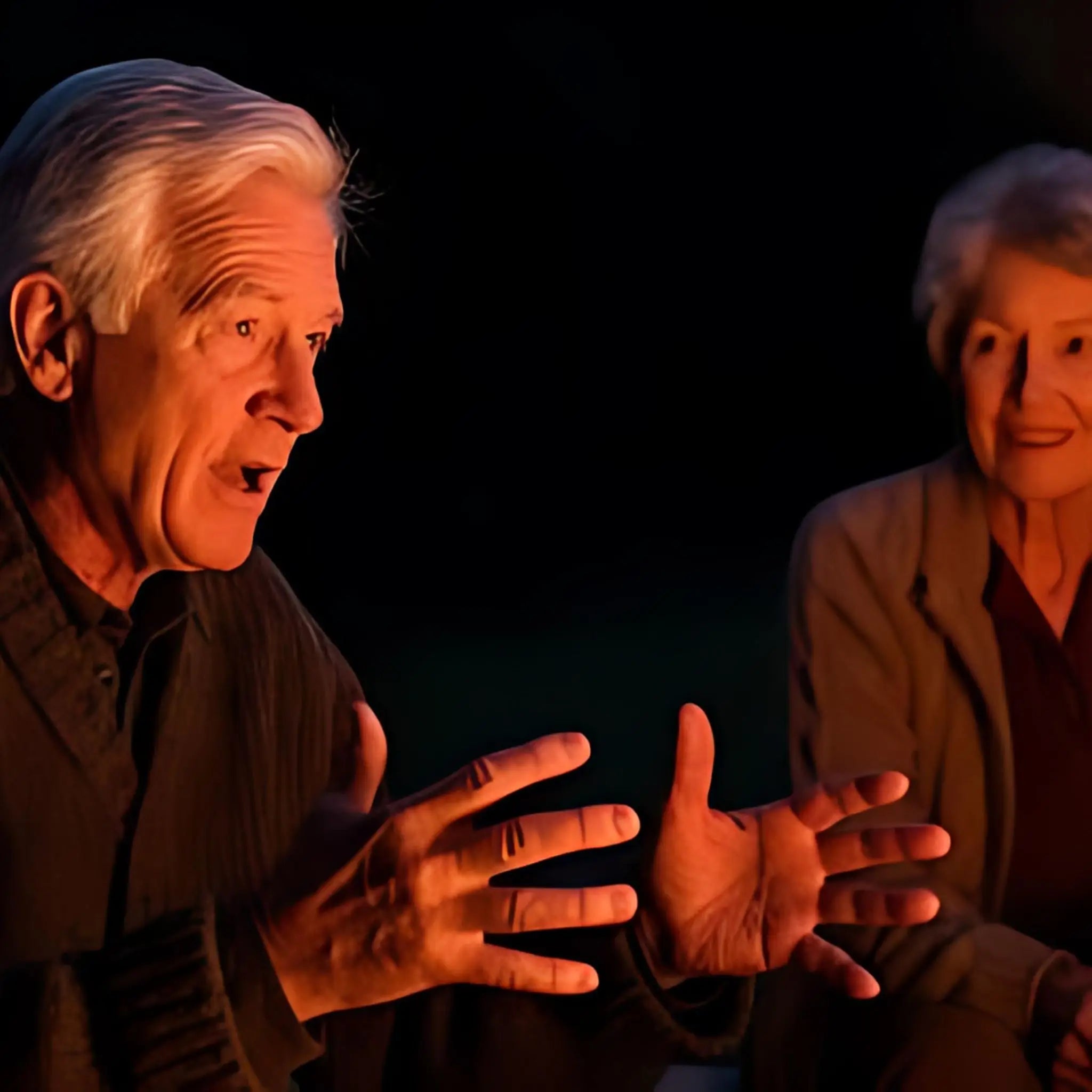 An elderly man passionately telling a story by the campfire at night, surrounded by friends enjoying a warm and cosy glamping experience.