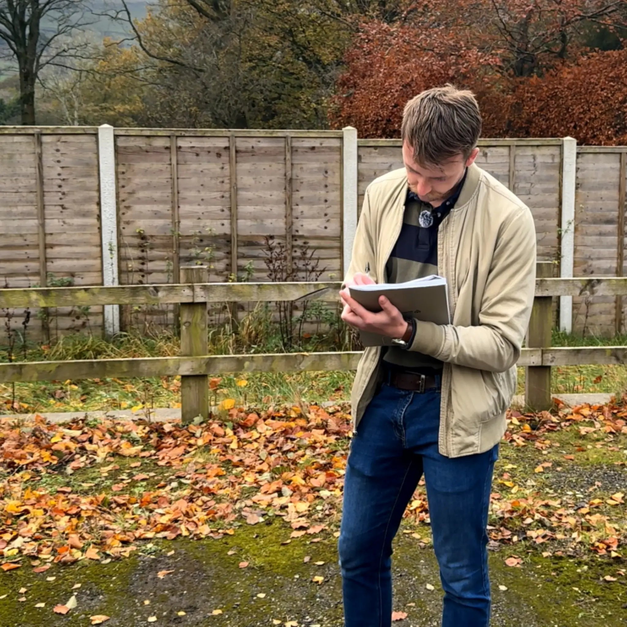 Glamping planning consultant conducting site survey and land assessment before submitting planning permission application