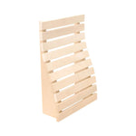 Premium sauna bench backrest in light aspen wood with a curved slatted design on a white background.