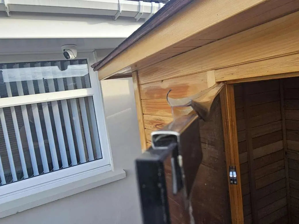 Close-up of the first sauna sale that went wrong—misinstalled eaves/flashing causing leaks, later replaced by the manufacturer.