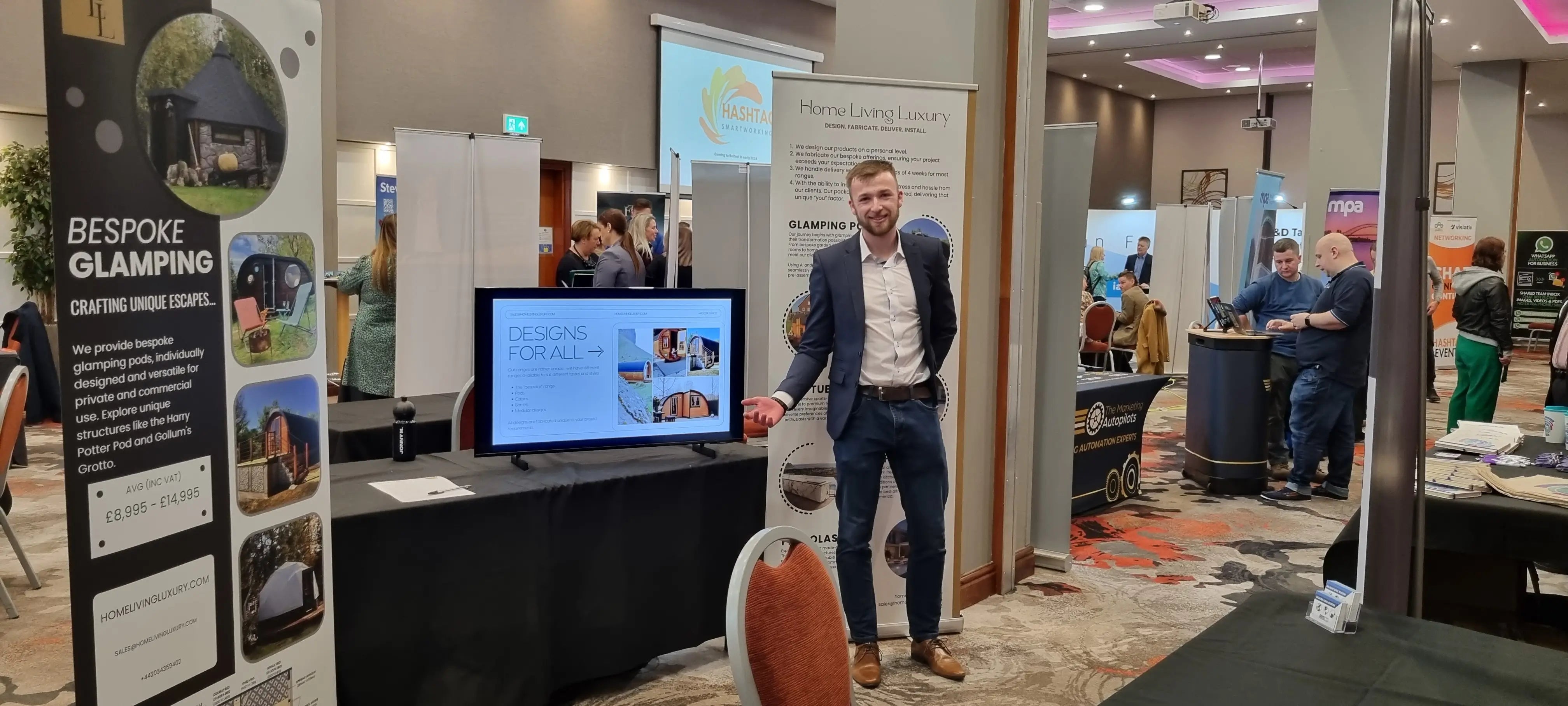 Taylor Glass at his first trade show at the Clayton Hotel, Belfast, presenting Home Living Luxury with a small stand and slideshow.