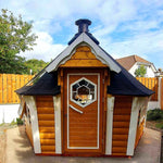 Yellow Glamping Cabin Front with Wide Window