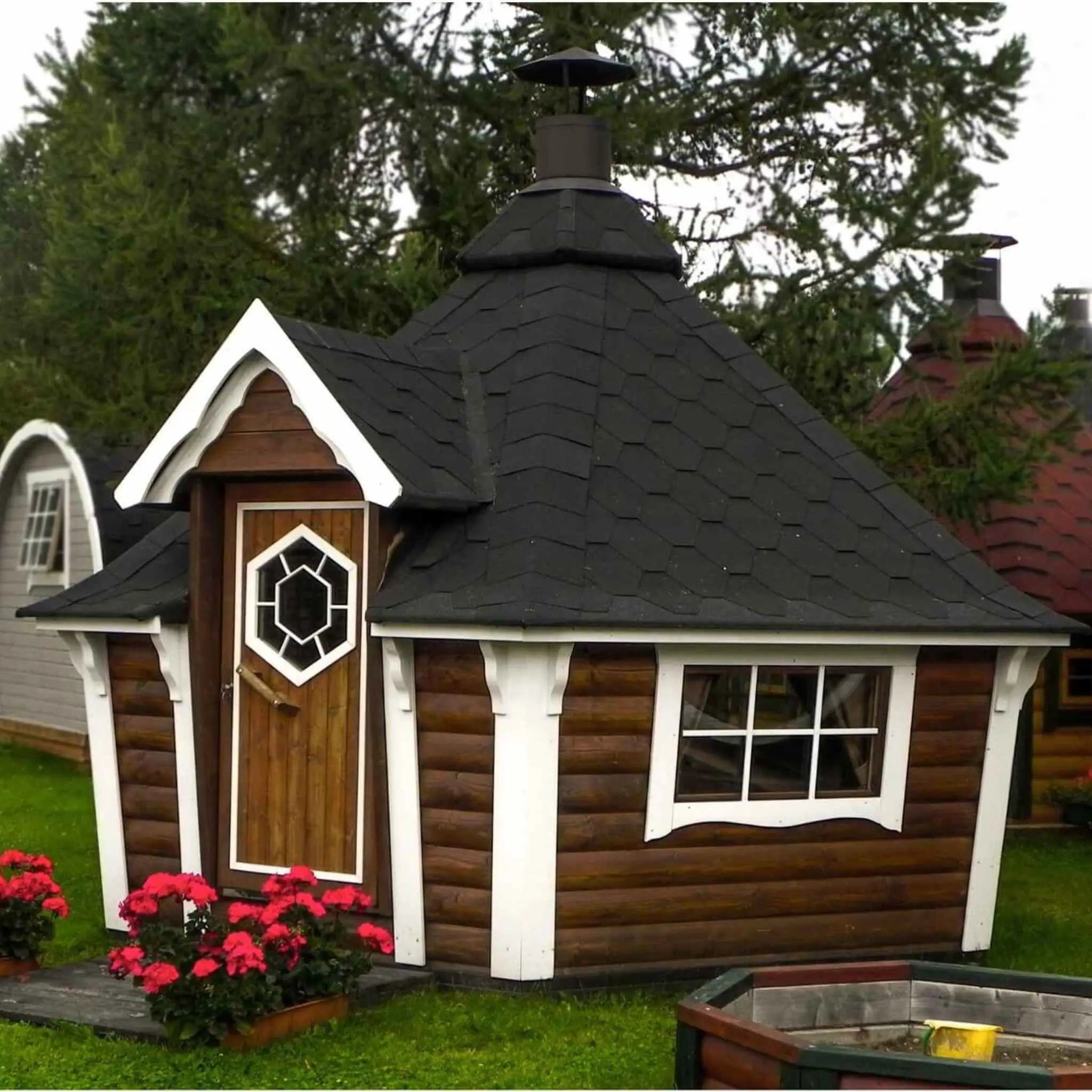 Side View of Brown Cabin with Window Panels