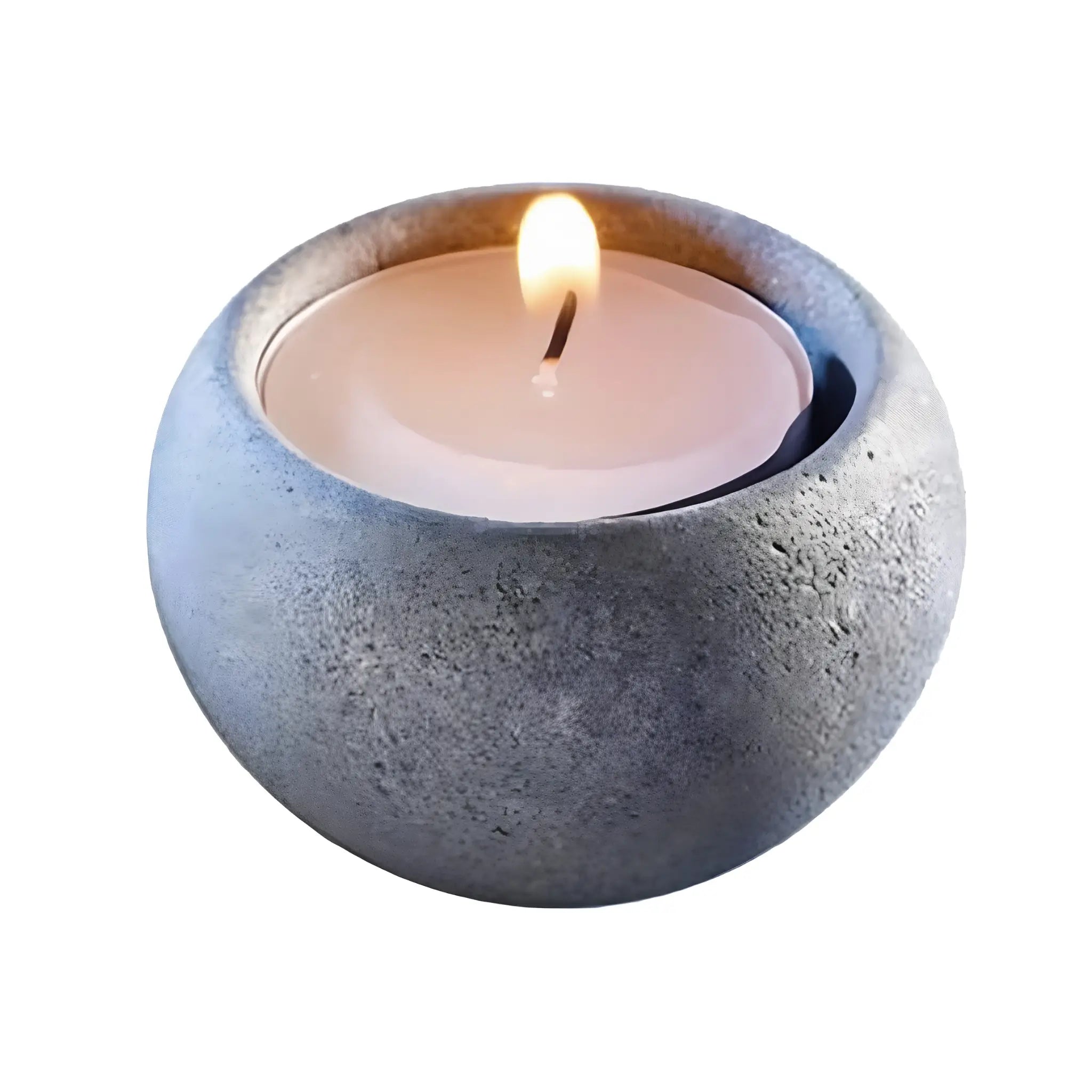 Hukka soapstone tealight holder with a lit candle, showing the rounded natural stone finish