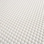 Close-up of the Komfi Unity Pocket Mattress breathable textured fabric cover designed for long-lasting commercial performance.