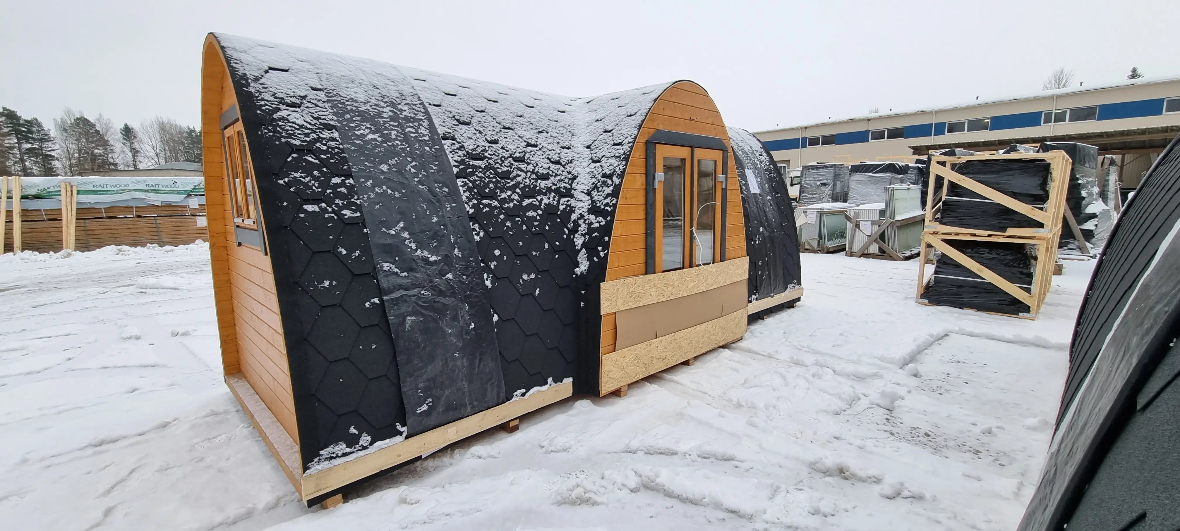 Hobbit glamping pod sitting in the snow at the Lithuanian supplier’s factory during Taylor’s 2023 quality visit.