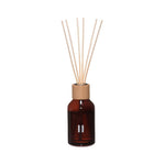 Rento Arctic Berries reed diffuser with natural wooden reeds and amber glass bottle