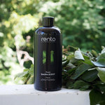 Rento Forest Sauna Scent 400ml displayed outdoors beside fresh birch branches, inspired by Nordic forests and traditional Finnish sauna experiences.