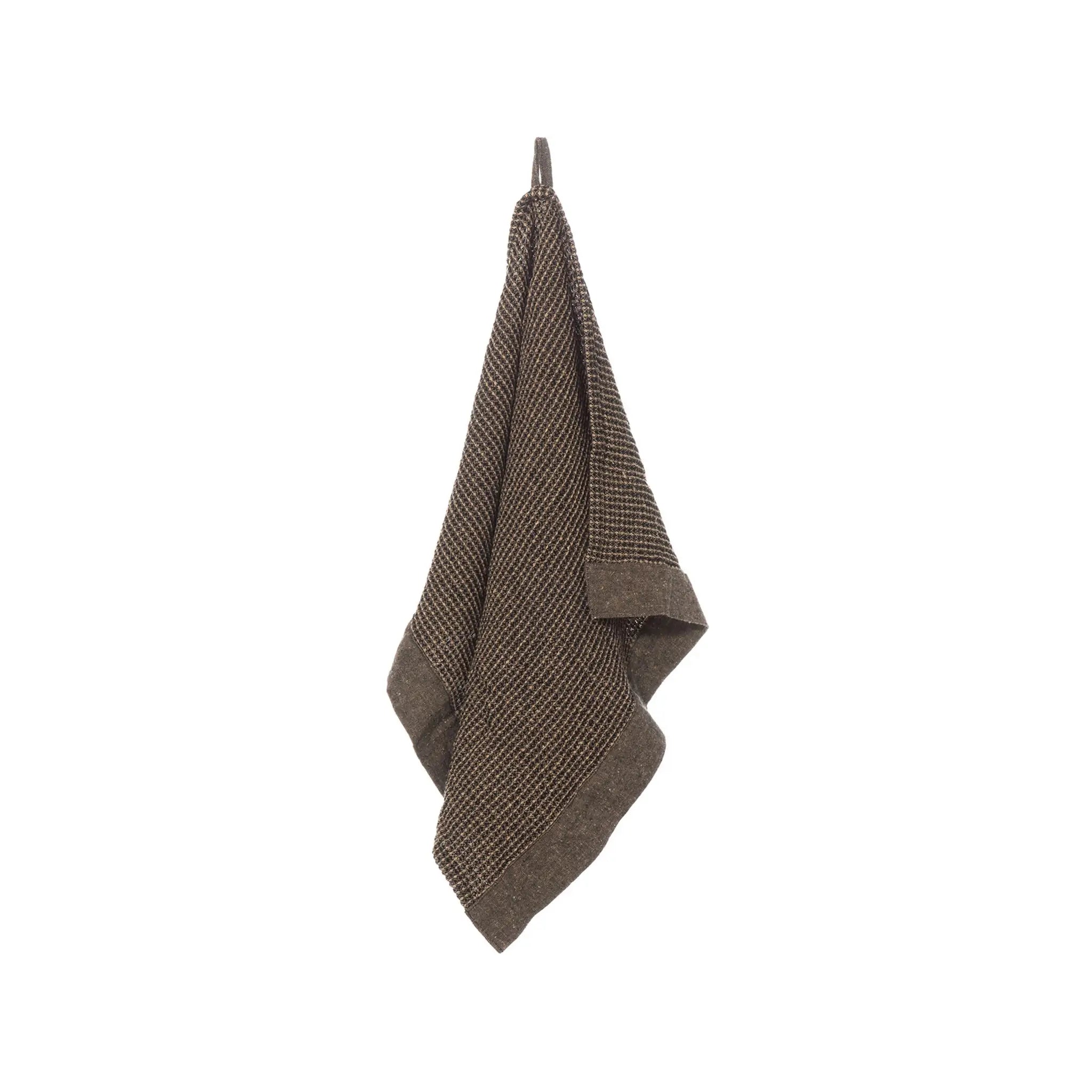 Brown Rento Kenno hand towel 50 x 70cm hanging with textured waffle weave and matching edging.