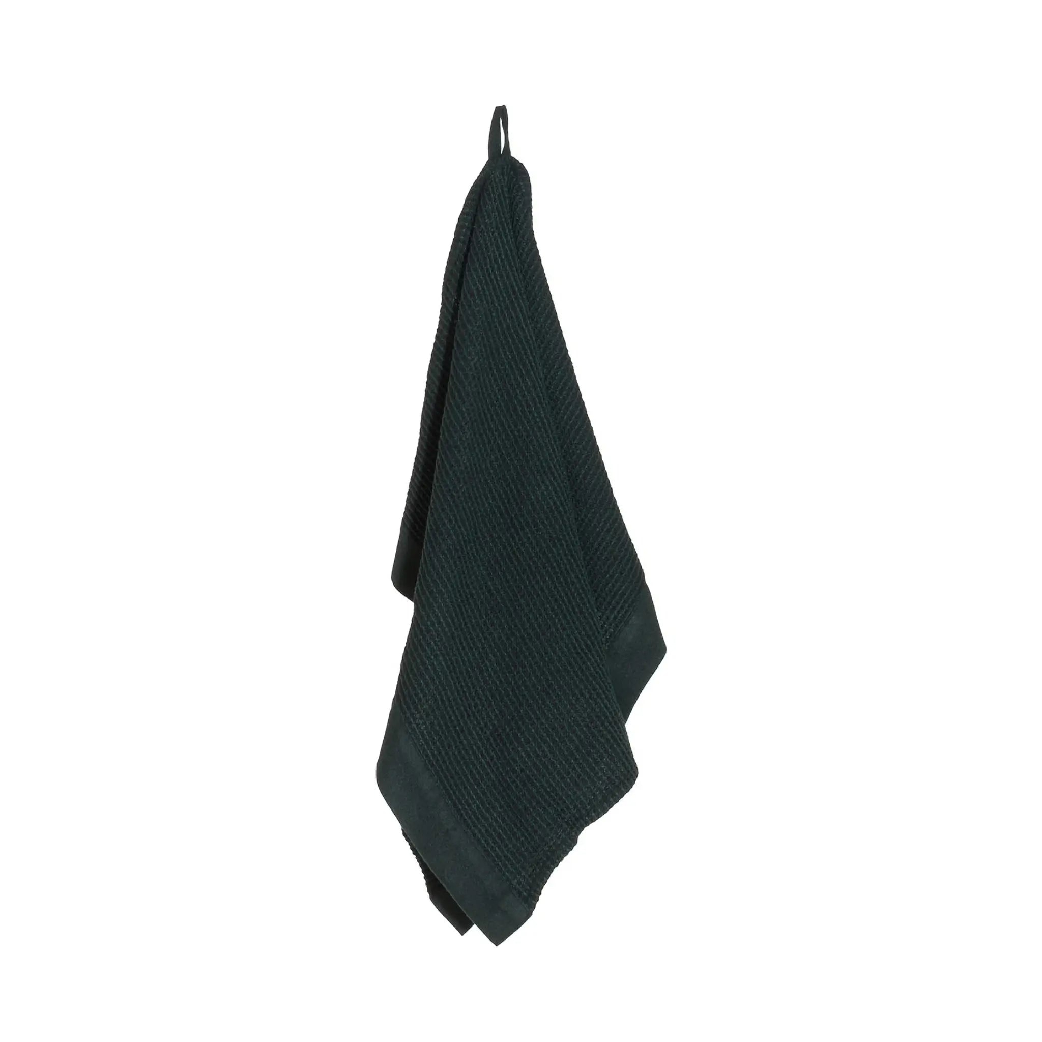 Dark green Rento Kenno hand towel 50 x 70cm hanging with textured waffle weave and matching trim.