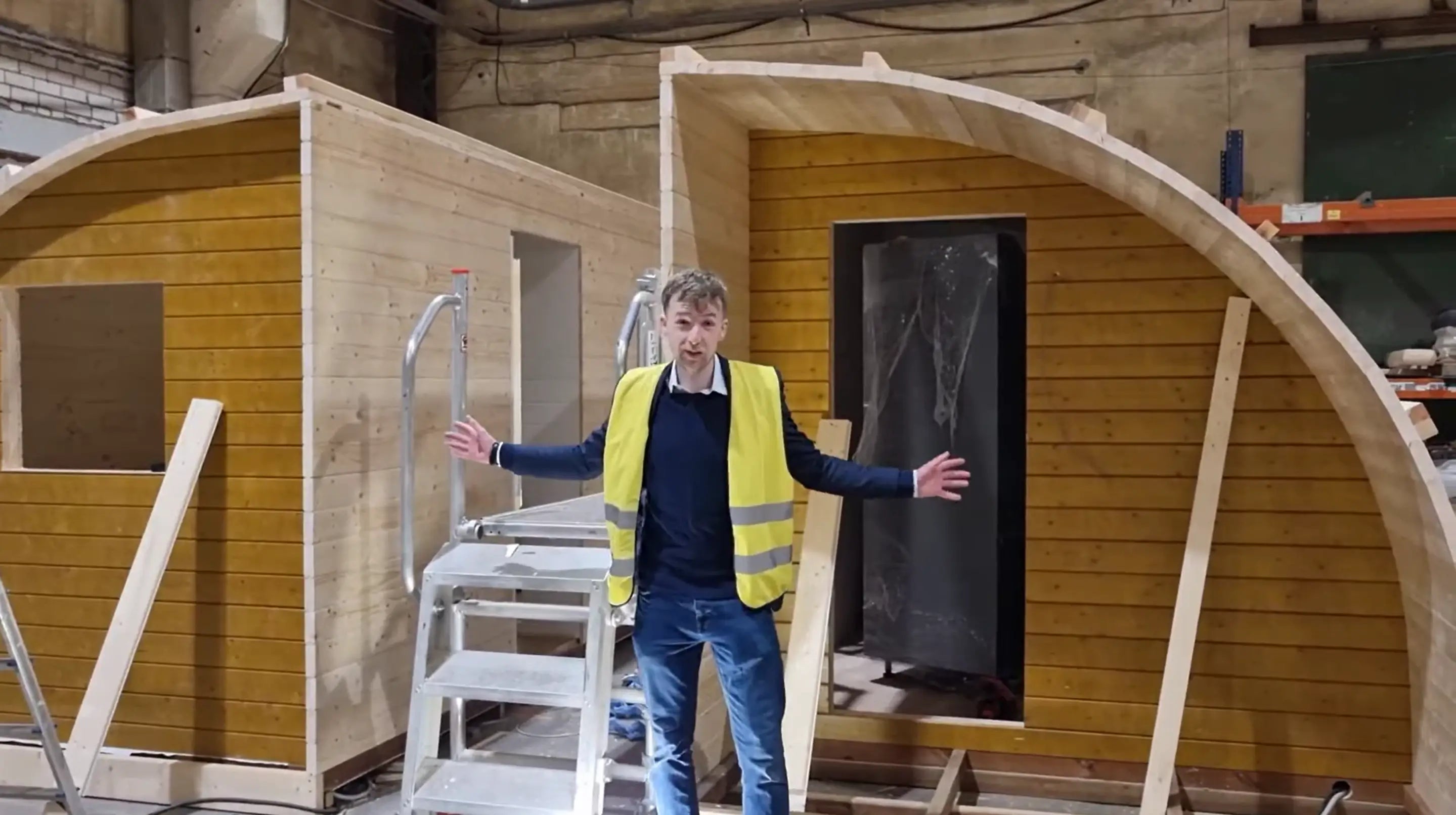 Taylor Glass on-site at the Lithuanian factory inspecting The Crown at Pantygelli’s glamping pods during production in December 2024.