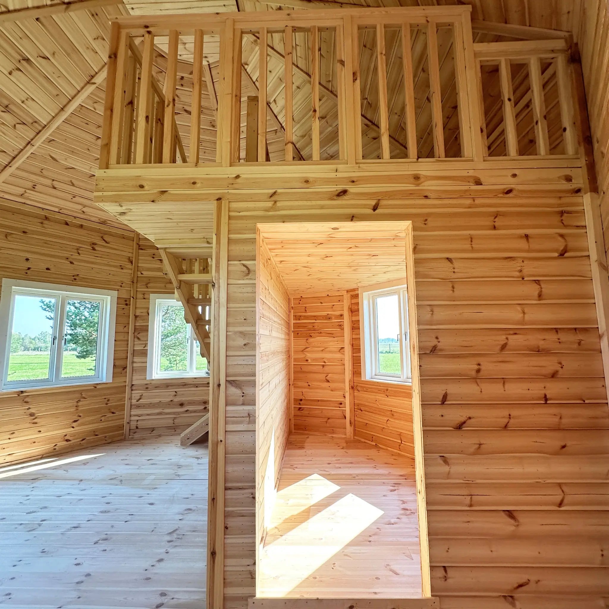 Ground-floor enclosed room beneath the loft, suitable for bedroom or bathroom fit-out in the Altura Loft Cabin