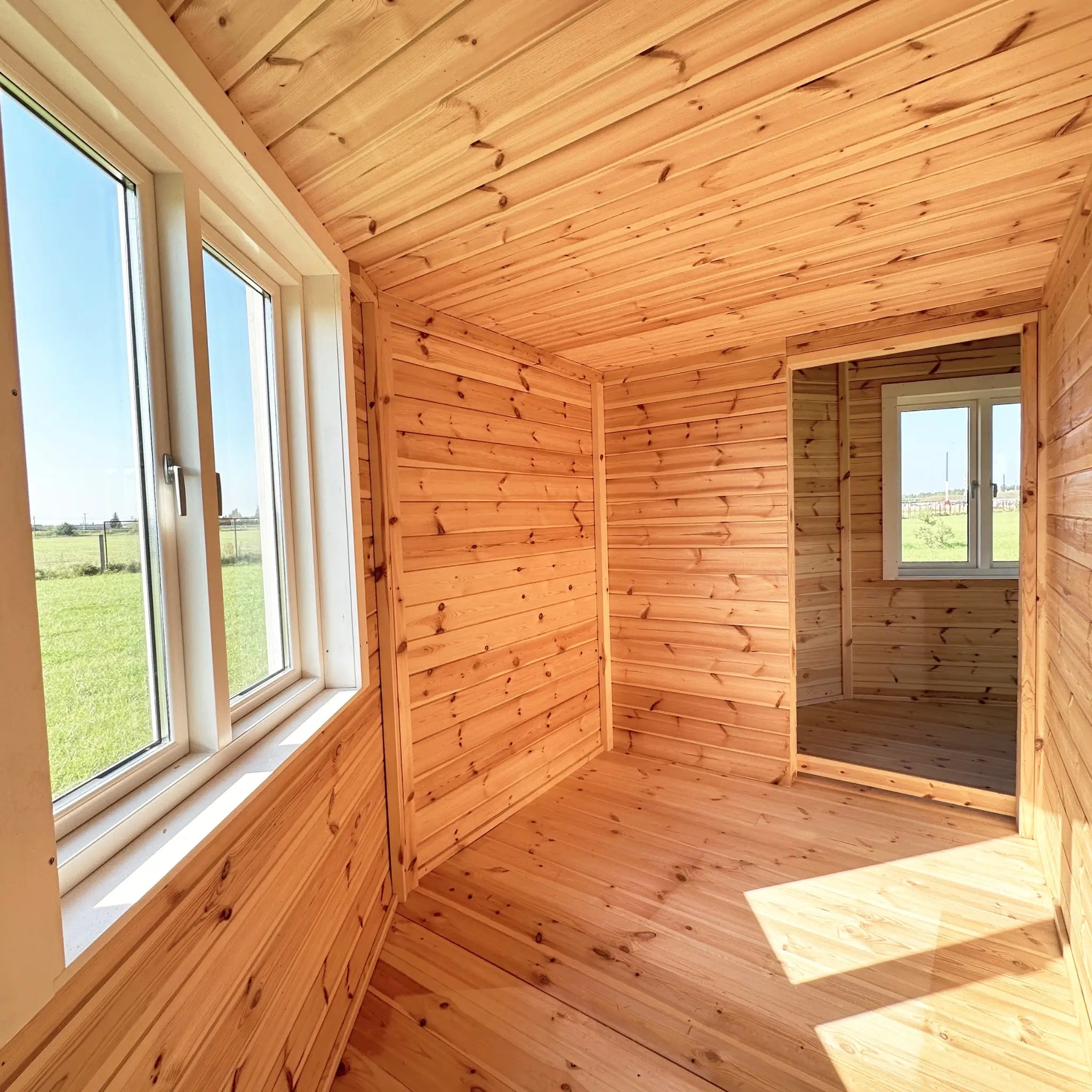 Ground-floor enclosed room beneath the loft, suitable for bedroom or bathroom fit-out in the Altura Loft Cabin