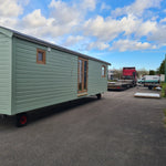 Side profile of Archwood glamping shepherd’s hut before installation