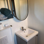 Vanity sink detail inside the Archwood shepherd’s hut bathroom