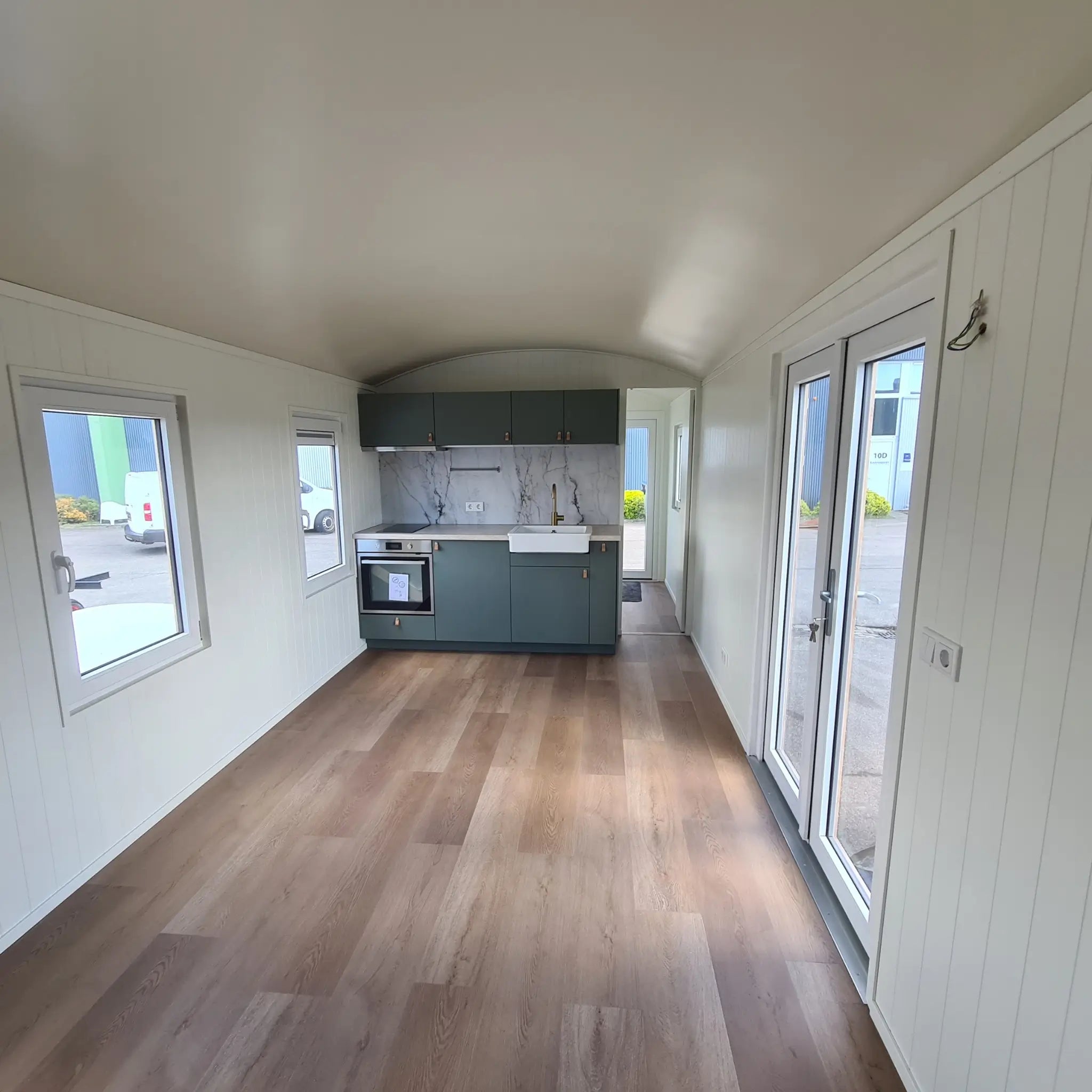 Interior corridor view of the Archwood shepherd’s hut showing spacious layout