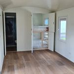 Bunk bed sleeping area inside the Archwood shepherd’s hut for children or guests