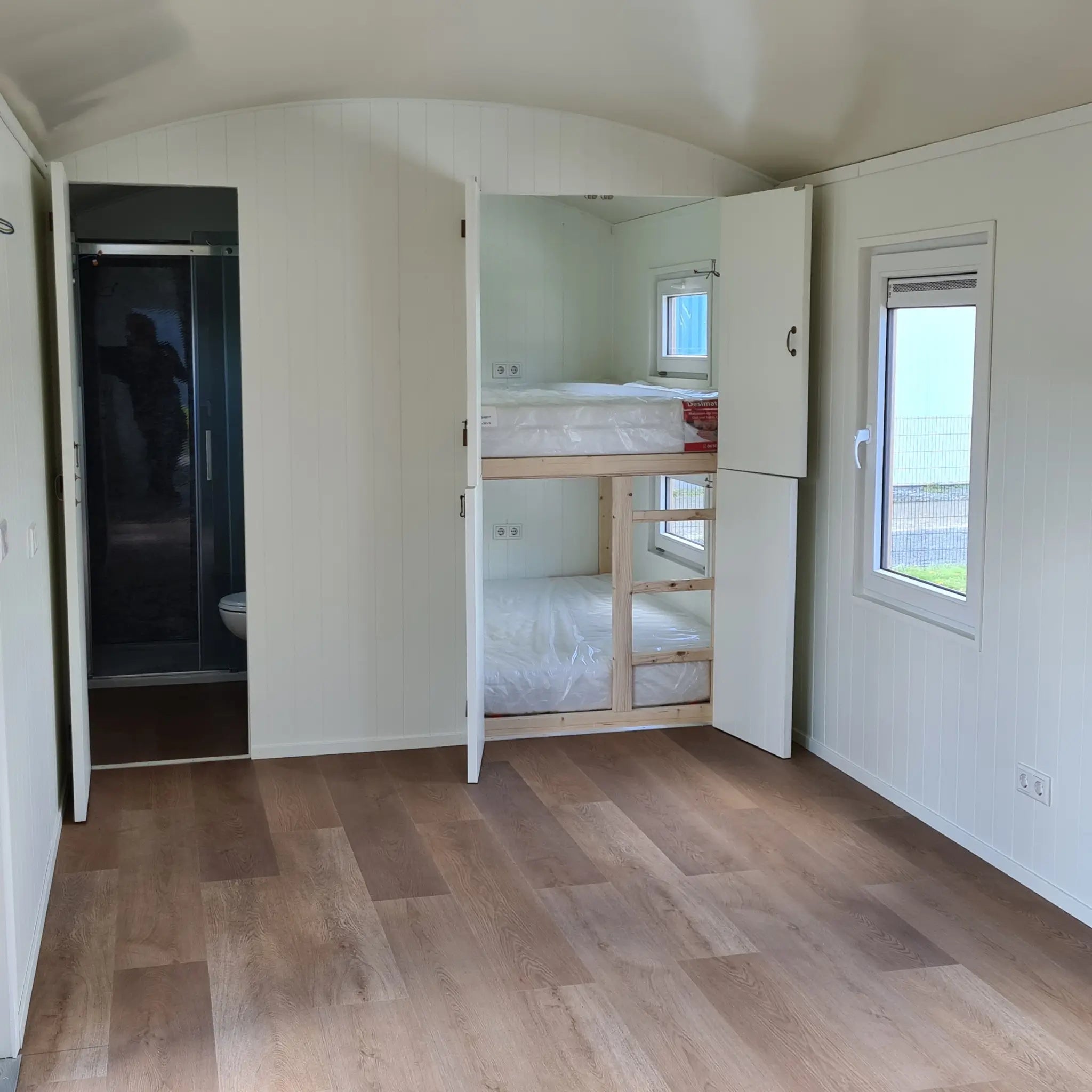 Bunk bed sleeping area inside the Archwood shepherd’s hut for children or guests