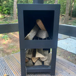 Outdoor wood burning stove on the deck of Bowridge glamping shepherd’s hut