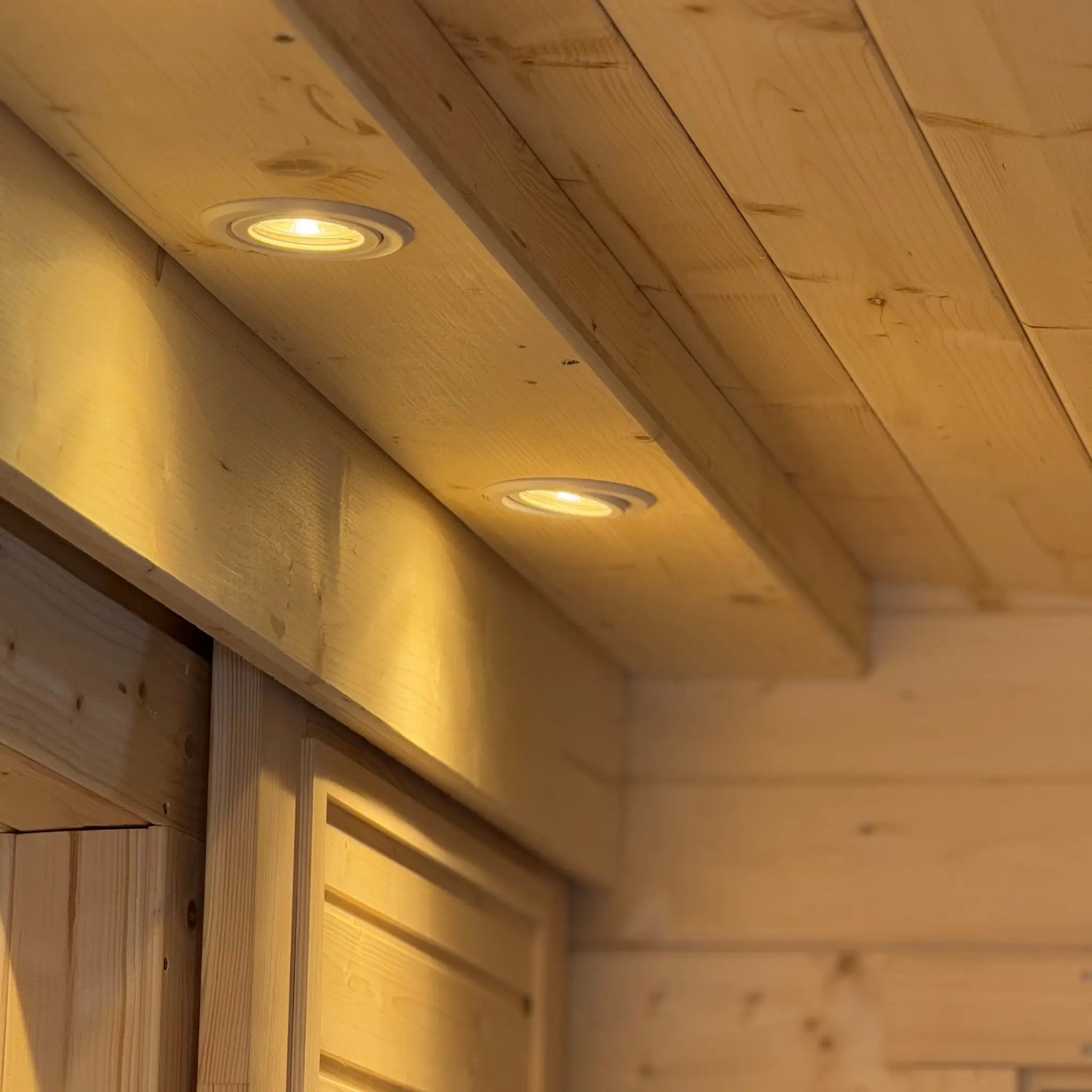 Curved Timber Ceiling with Downlights Inside Glamping Pod