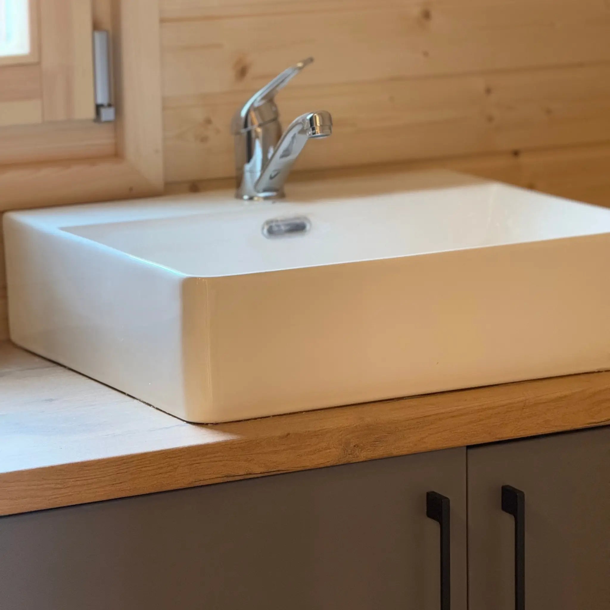 Close-Up Bathroom Sink Detail in Dual Halfmoon Pod