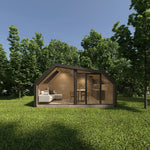 Front exterior view of The Eagle's Nest luxury 2 person glamping pod with floor-to-ceiling glazing and timber-clad finish