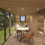 Dining area beside panoramic glazing inside The Eagle's Nest luxury 2 person glamping pod with woodland views