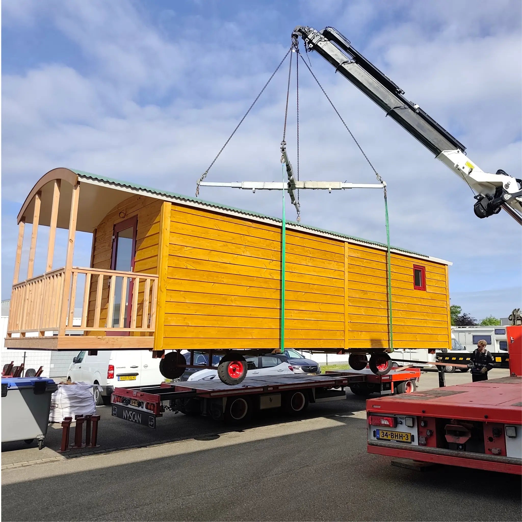 The “Fernwood” timber Art Studio being crane lifted onto a transport vehicle