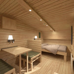 Interior view of The Grotto Pod showing convertible dining table, bench seating, and double bed in an open-plan layout.