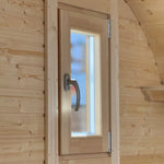 Rectangular opening window inside Grotto glamping pod with timber frame and ventilation feature