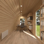 The Halfmoon Garden Office Pod interior showing a spacious two-person office setup with desks, shelving, storage and timber-lined finish.