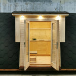 Front close-up view of The Hearthwood Pod luxury glamping pod highlighting double glass doors and modern finish