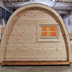 Rear exterior view of the Hearthwood luxury 6 person glamping pod with timber cladding and curved roof