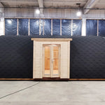 Front exterior view of the Hearthwood luxury 6 person glamping pod with double doors and curved roof design