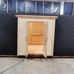Close-up front exterior view of the Hearthwood luxury 6 person glamping pod entrance doors