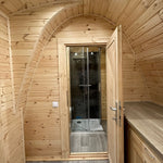 Bathroom entrance with glass shower enclosure inside The Hearthwood Pod luxury 6 person glamping pod