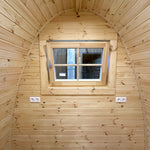 Timber-framed window with insulated glazing inside The Hearthwood Pod luxury glamping pod