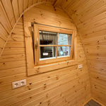 Side View of timber-framed window with insulated glazing inside The Hearthwood Pod luxury glamping pod