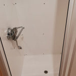 Modern enclosed shower interior inside The Hearthwood luxury glamping pod