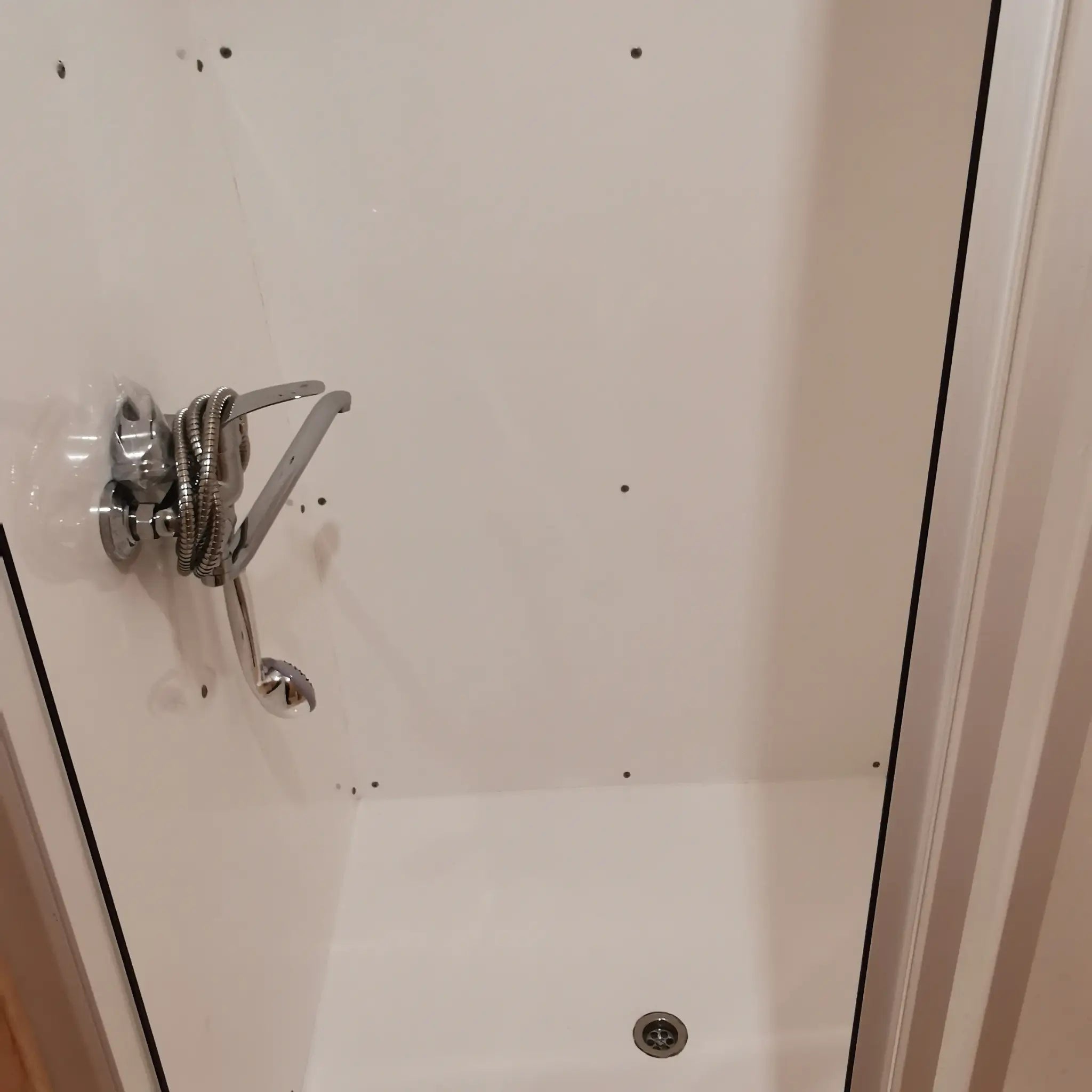 Modern enclosed shower interior inside The Hearthwood luxury glamping pod