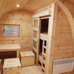 Open dining area with radiator and bunk beds in The Hearthwood Pod luxury 6 person glamping pod interior