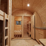 Interior hallway view showing open bedroom doors and sleeping areas in the Hearthwood 6 person glamping pod