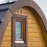 Hobbit Pod Exterior Window Detail with Timber Cladding and Curved Roof