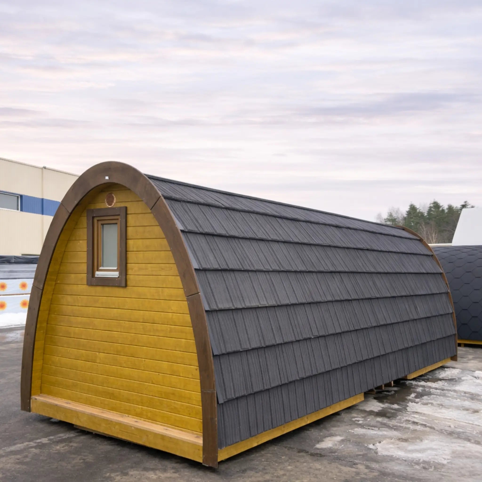 Rear View of Hobbit Pod Showing Curved Timber Structure