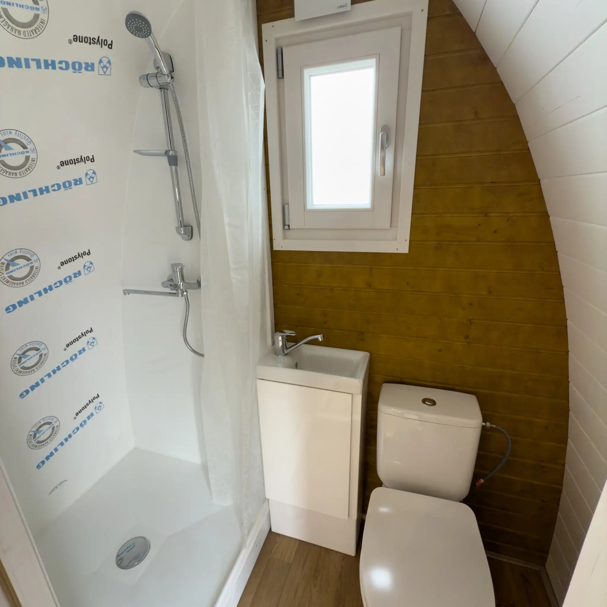 Compact Bathroom Inside Hobbit Pod with Shower and Toilet