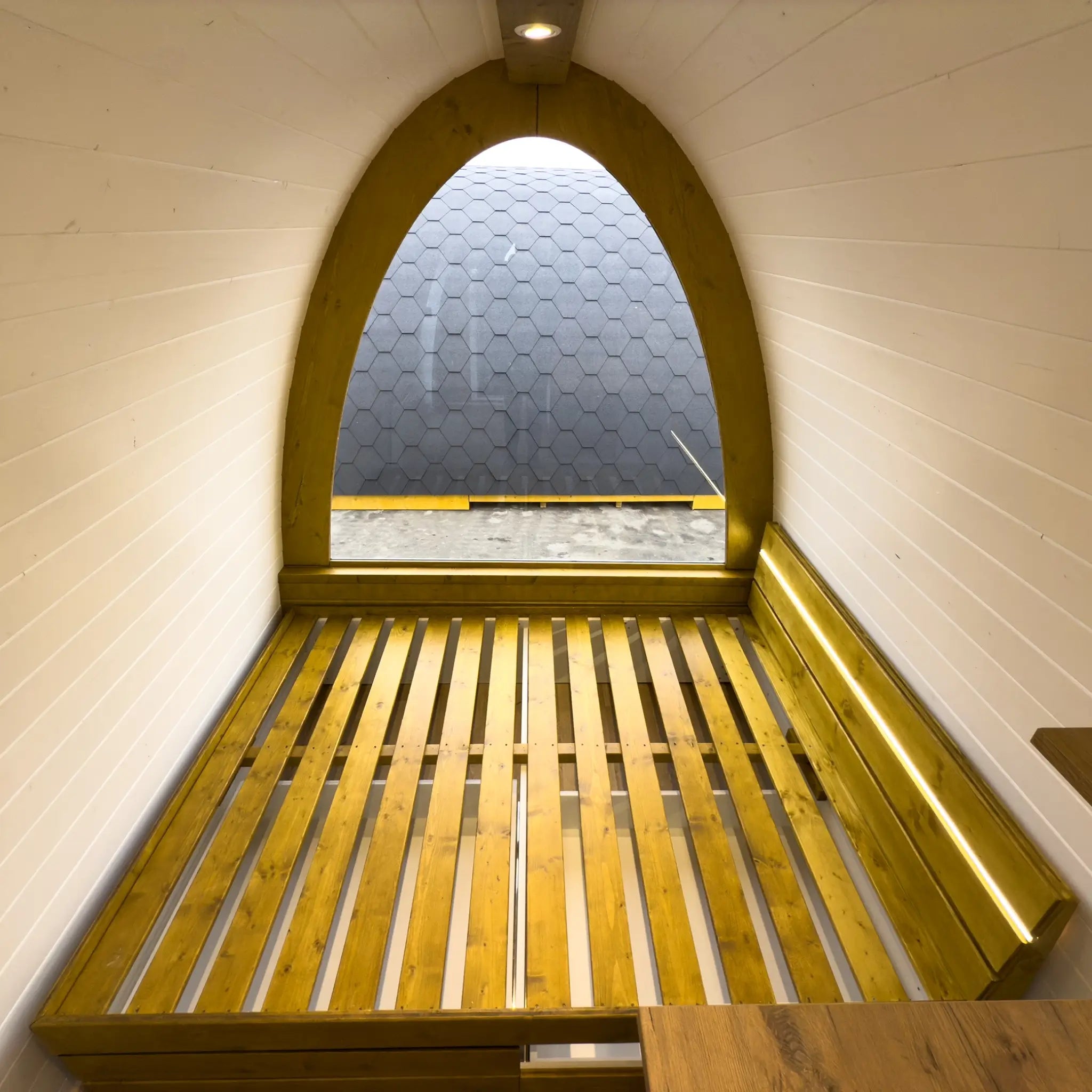 Wooden Bed Platform Inside Luxury Hobbit Pod Bedroom