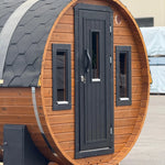 Front view of the Infinity Glass luxury 8 person barrel sauna with changing room