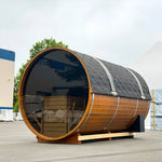 Side perspective of the Infinity Glass luxury barrel sauna highlighting the panoramic glass wall